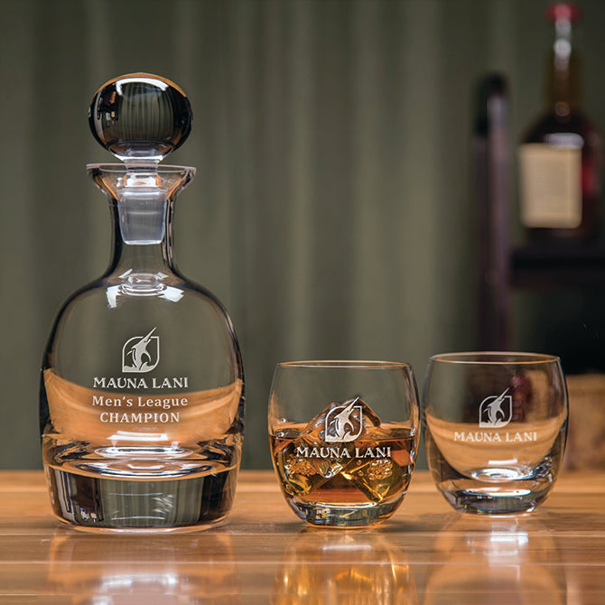 A decanter and 2 glasses with custom engraving