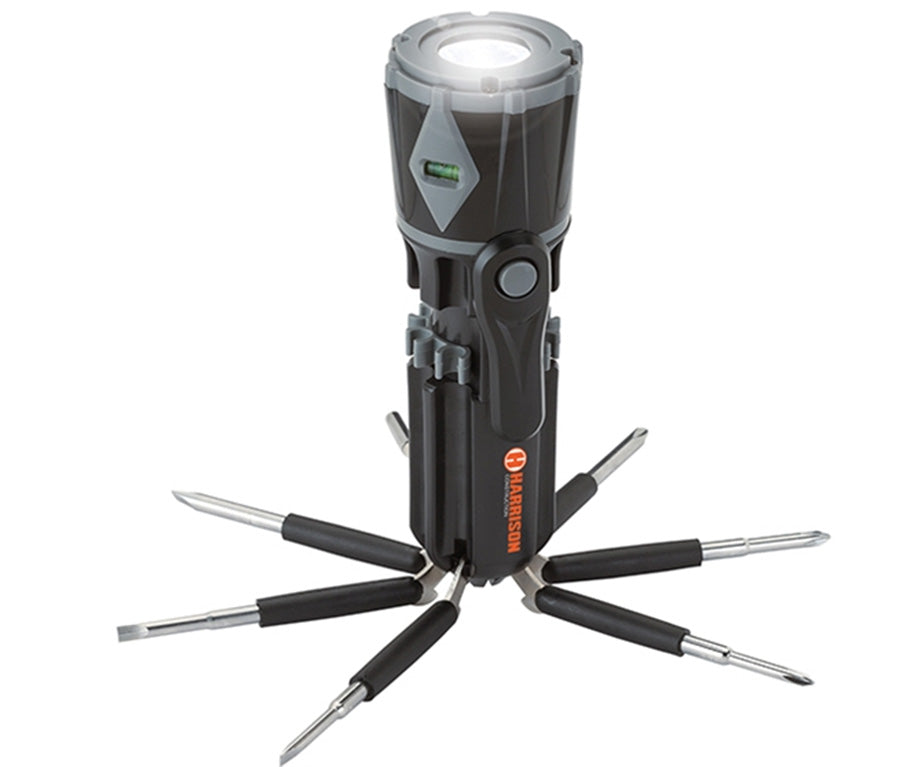 Multitool with flashlight and multiple tools on a white background