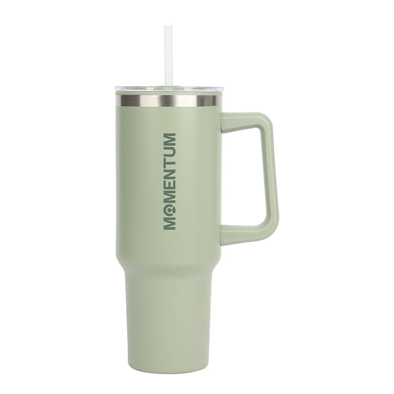 A green insulated mug with handle and straw