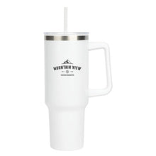 Load image into Gallery viewer, A white insulated mug with handle and straw
